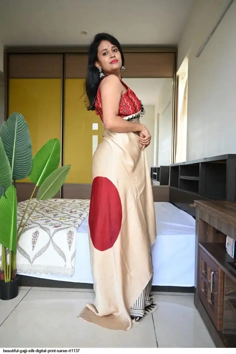 Model draped in Beige Red Bindi Handcrafted Ajrakh Saree

