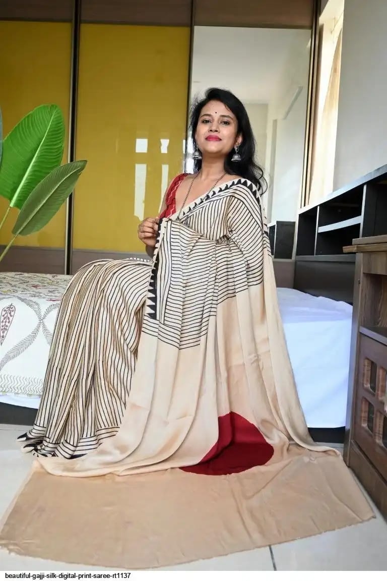 Model draped in Beige Red Bindi Handcrafted Ajrakh Saree

